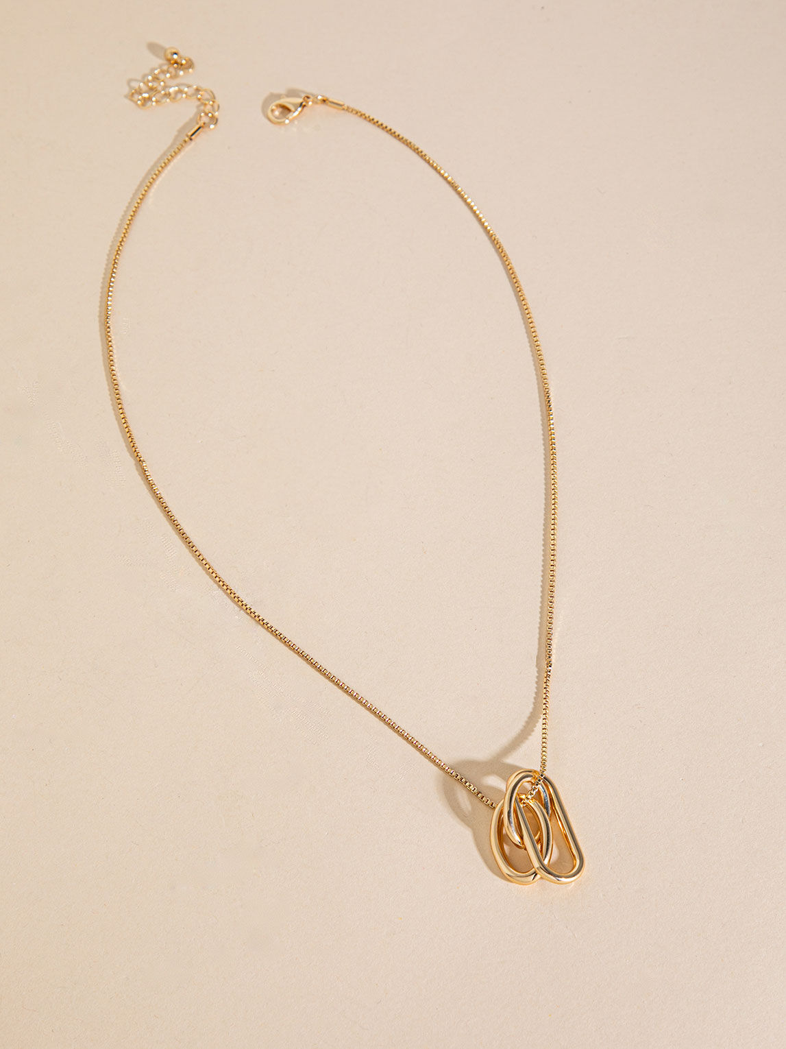 Gold charm on silver chain deals