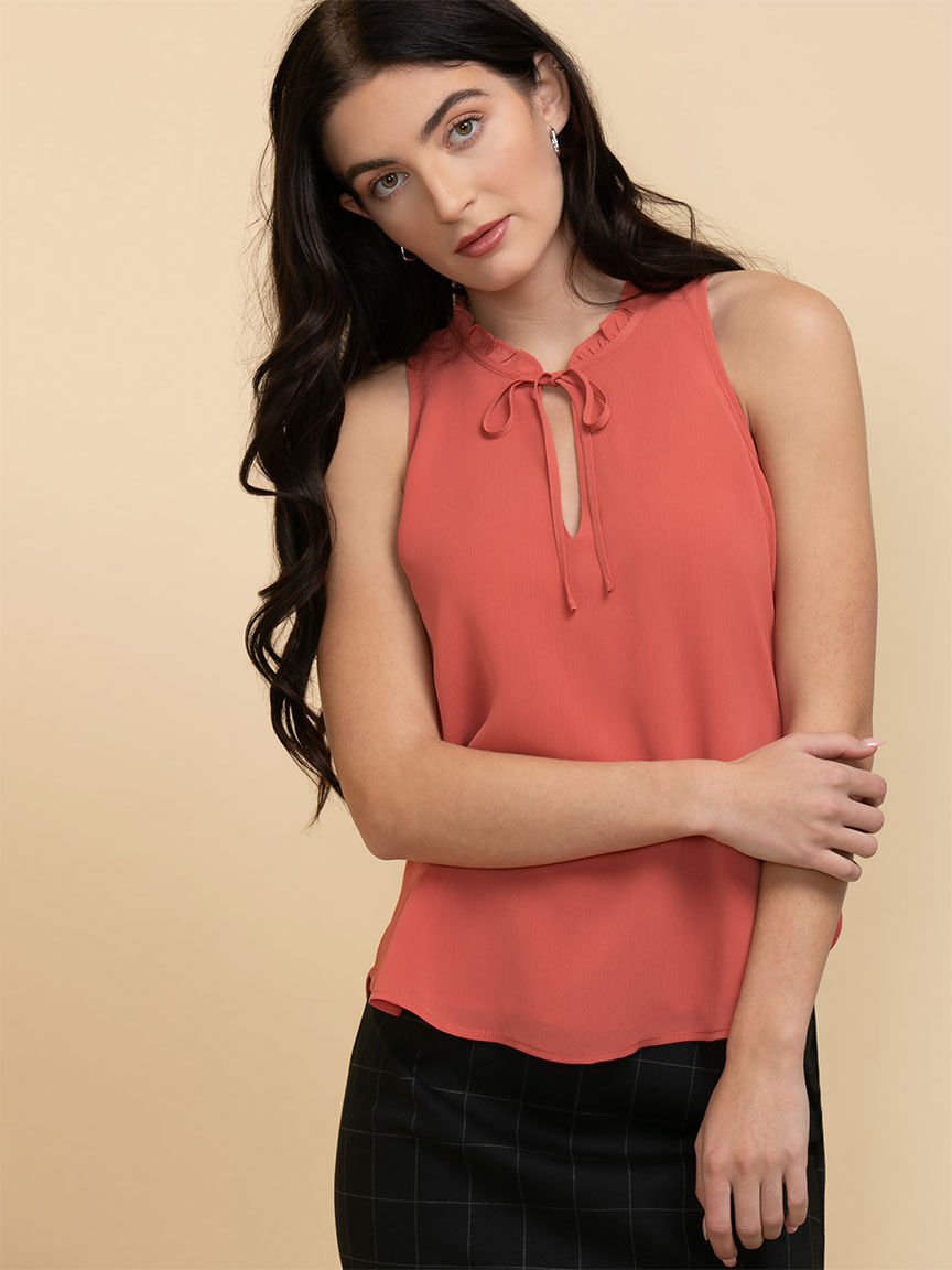 Sleeveless ruffle neck top outlet