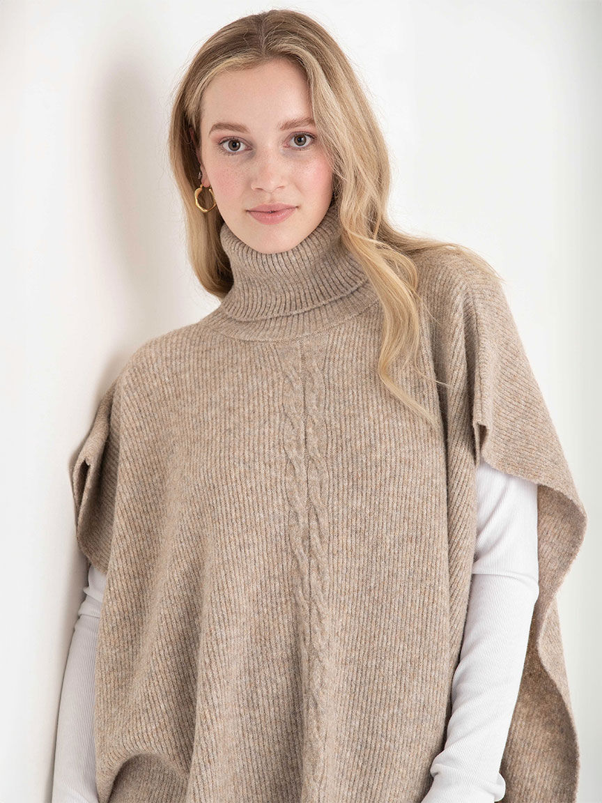 Turtleneck Poncho Sweater With Cable Knit Detail Ricki s Size One Size Oatmeal Colour